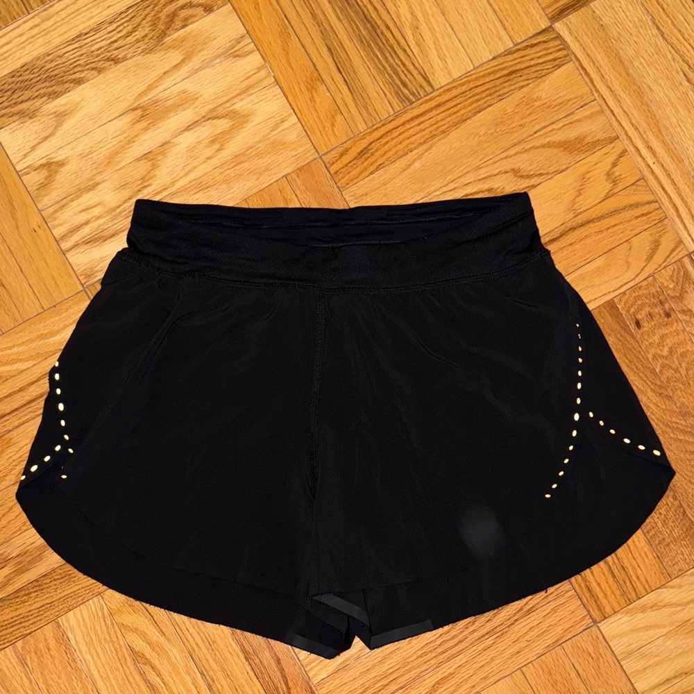 Lululemon Athletica Black Shorts with Gold Details